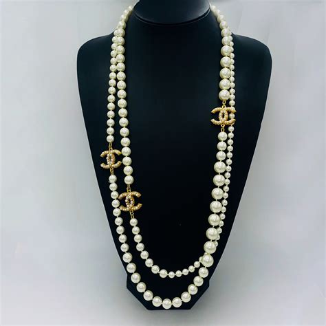 chanel pendant cc|long chanel necklace with pearls.